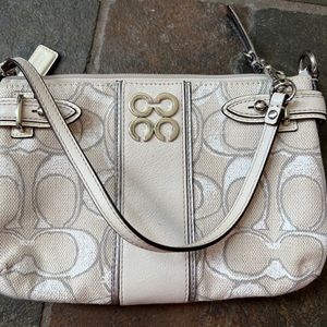 Canvas coach wristlet